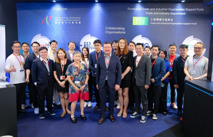 Chien (centre in blue jacket) with Denise Ang of Protemp (in floral dress) with members of the Hong Kong Pavilion. — Picture courtesy of MTE